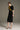 Black Crepe Bodycon Dress with Golden Tailored Collar